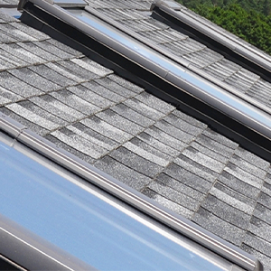 Chandler's Roofing Skylights - asphalt roof with 3 skylights