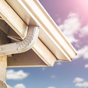 Chandler's Roofing Gutter Services - Off white k-style seamless gutter system