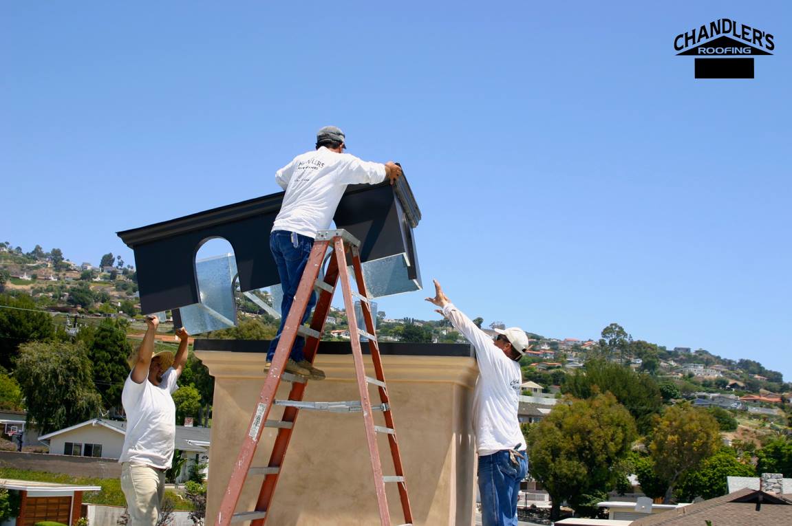 Chandler's Roofing Images - Contractors working on a roof