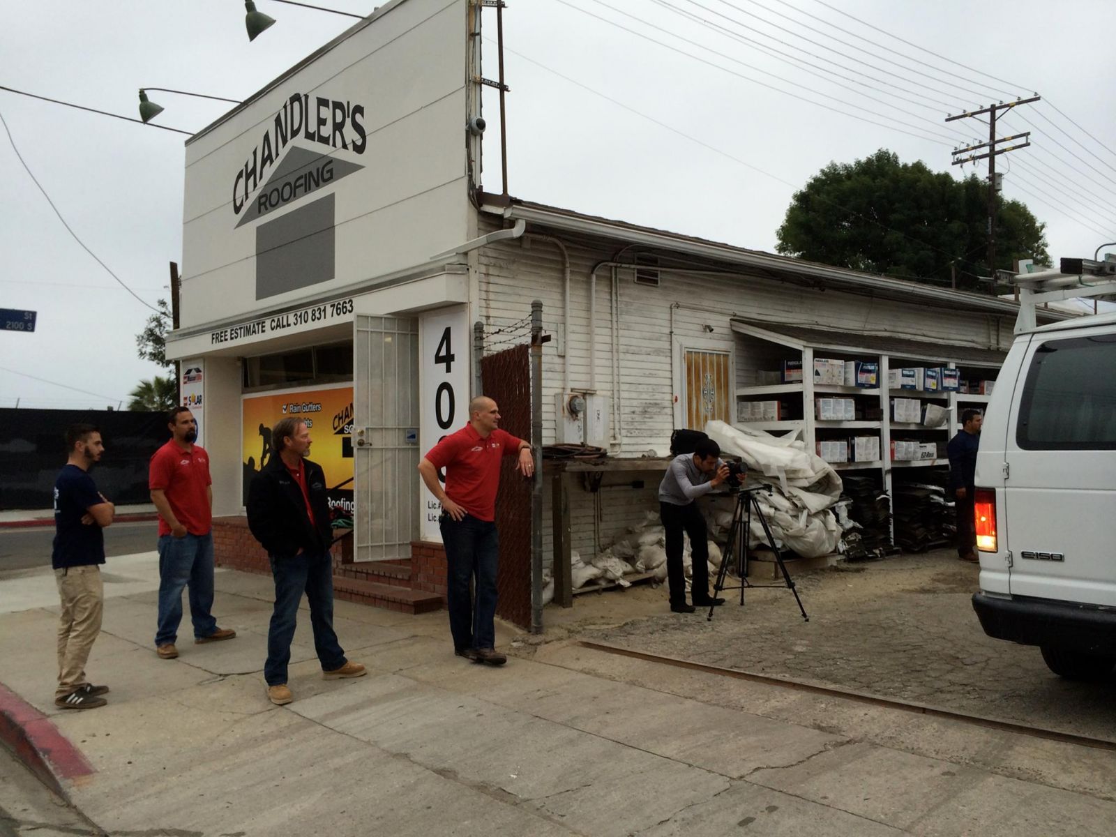 Chandler's Roofing Images - Employees standing outside office