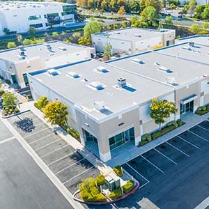 Chandler's Roofing Commercial Roofing - Aerial of commercial roof with flat top roofing